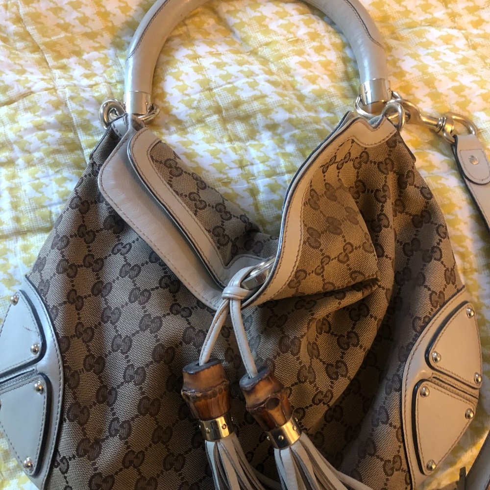 Gucci Brown Monogram Canvas Medium Indy Tassel Bag with Strap.